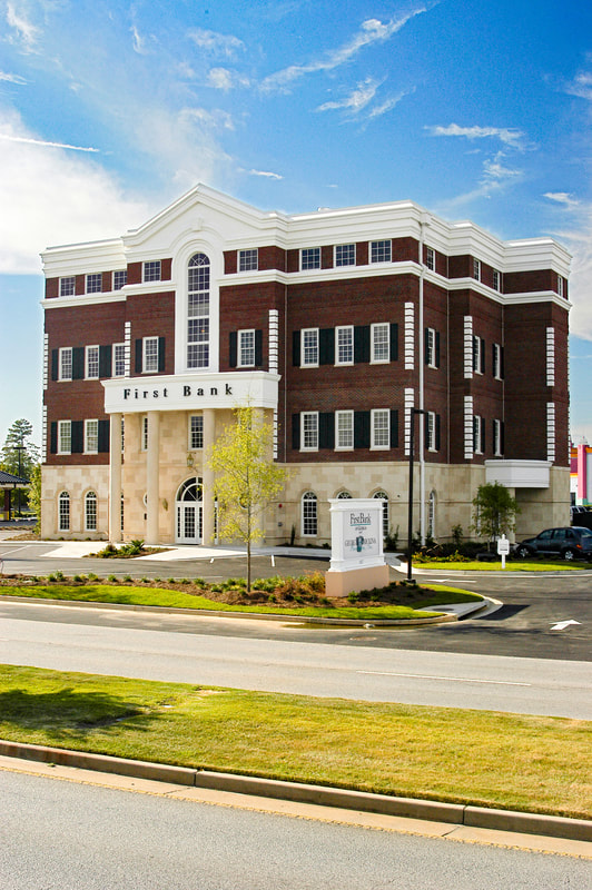 This traditionally styled four story building was designed by Studio 3 Design Group to be the main location of First Bank in Augusta, Georgia. 