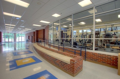hallway of Augusta Preparatory Day School Boardman Athletic Facility looking into exercise area 