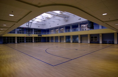 back view of Warren Baptist Family Life Center multi use sports court with view of upper and lower side level 