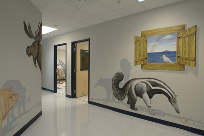 painted wall featuring aardvark, moose, and open window with seagull 