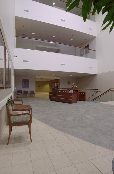 an open air waiting room and service desk area inside of Canter Medical Services Building 
