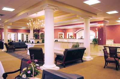 interior lobby and furnishings of First Bank of Augusta in warm tones