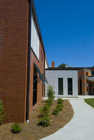 exterior brick building with awnings at Galloway Hall 