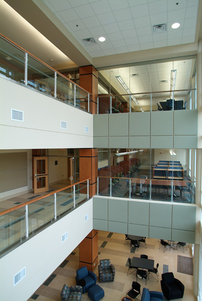 interior hallway with glass windows overlooking study rooms in University Hall at Augusta University