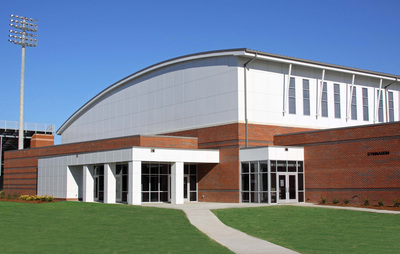 exterior white and red brick building with domed top of A.R. Johnson Magnet School 