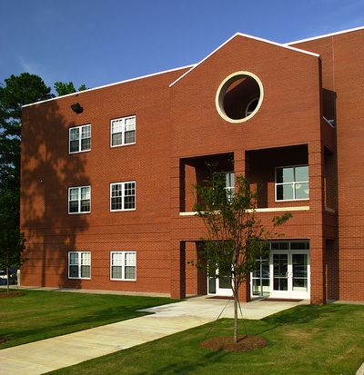 brick building of Warren Baptist Family Life building with geometric entrance way