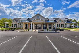 This is a picture of Evans Medical Group in Evans, Georgia focusing on the architecture of the building. The building was completed in August 2020. Studio 3 Design Studio is the firm responsible for the architectural design. 