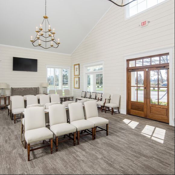 waiting room of Savannah River Dermatology with neutral design elements and wooden doors 