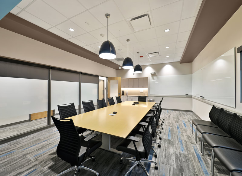 conference room in shades of grey at MAU workforce solutions 