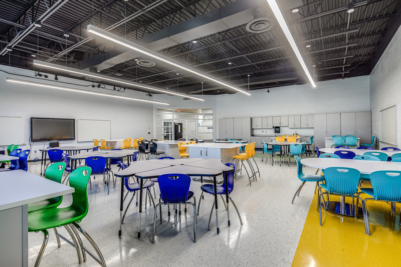 new Richmond Hill K-8 Replacement School colorful chairs in classroom 