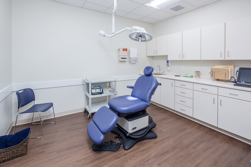 exam room/procedure room of Savannah River Dermatology practice done in clean, light neutral tones